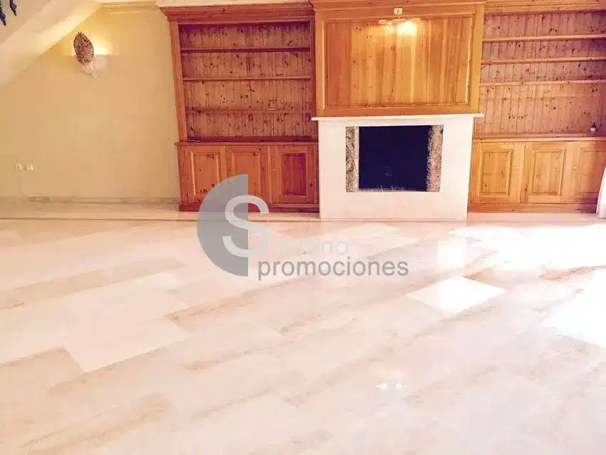 Sala de estar de Casa adosada de alquiler en Málaga con Aire acondicionado, Jardín privado y Terraza
