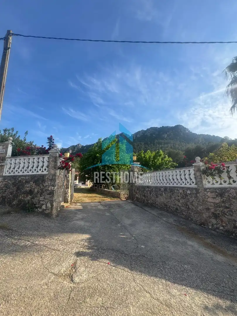 Vista exterior de Casa o xalet en venda en Quatretonda amb Aire condicionat, Jardí privat i Terrassa