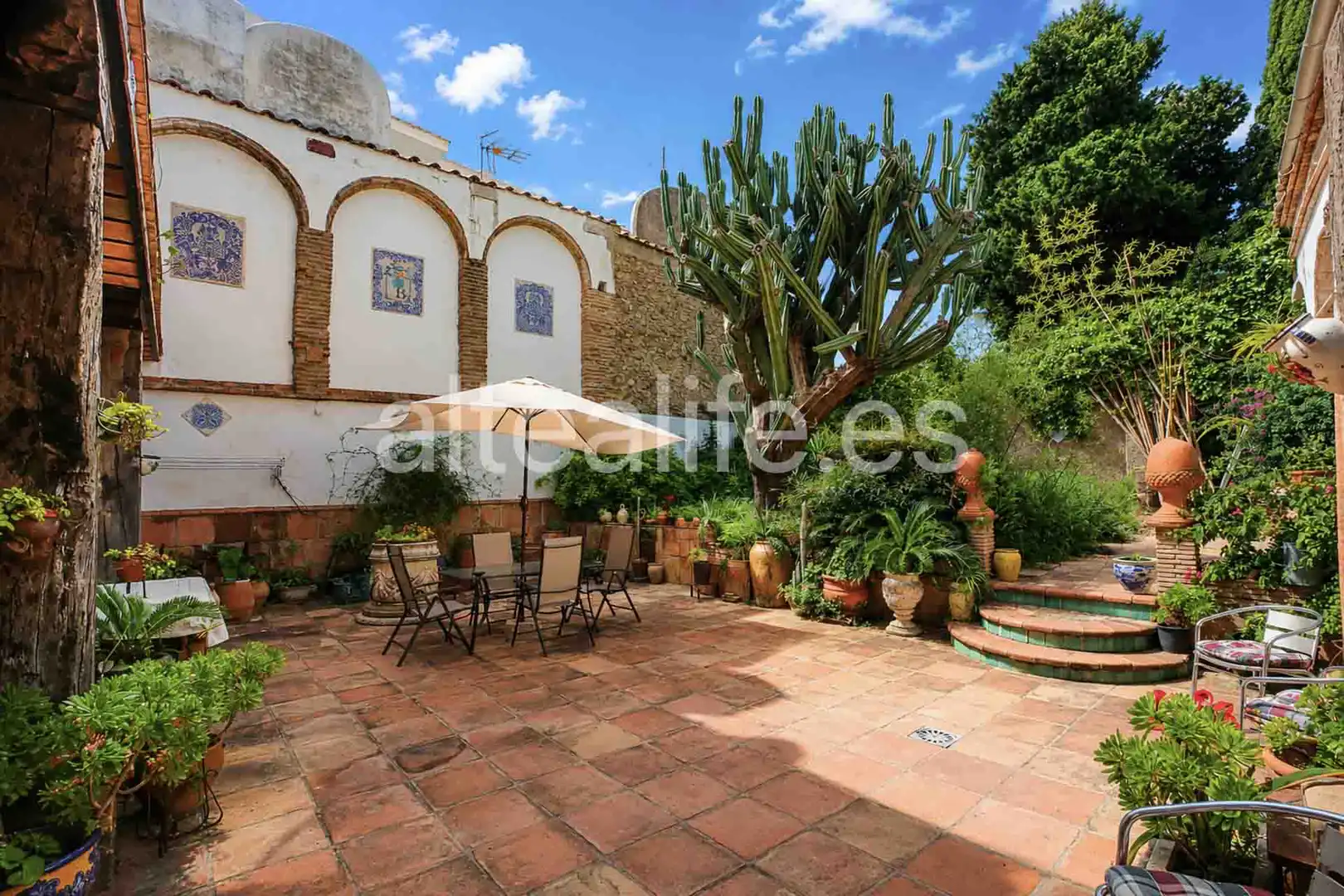 Garten von Einfamilien-Reihenhaus zum Verkauf in Gandia mit Privatgarten, Terrasse und Abstellraum