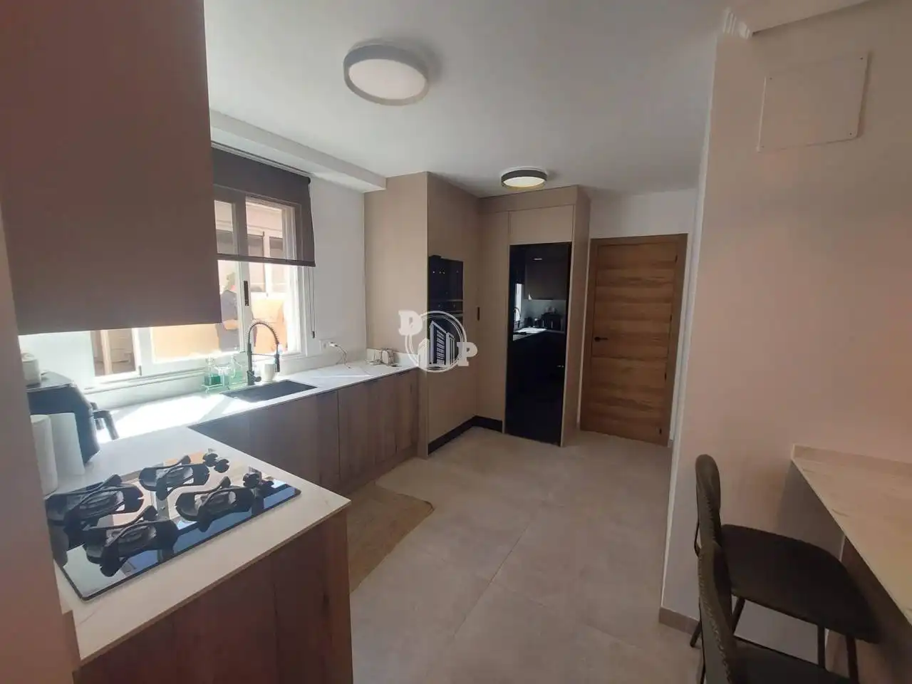 Cuina de Casa adosada en venda en Benidorm amb Jardí privat