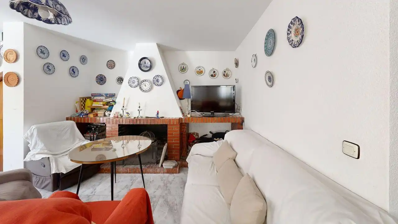 Sala d'estar de Casa o xalet en venda en Jaén amb Traster i Piscina comunitària