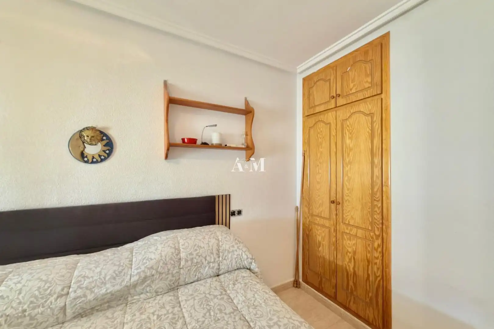 Dormitori de Casa adosada de lloguer en Santa Pola amb Aire condicionat, Calefacció i Jardí privat