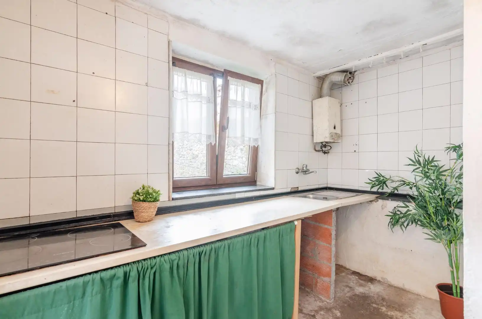 Küche von Einfamilien-Reihenhaus zum Verkauf in Cangas de Onís mit Heizung und Abstellraum