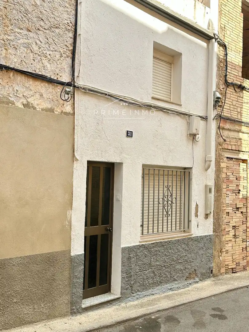 Vista exterior de Casa adosada en venda en El Perelló amb Aire condicionat, Calefacció i Terrassa