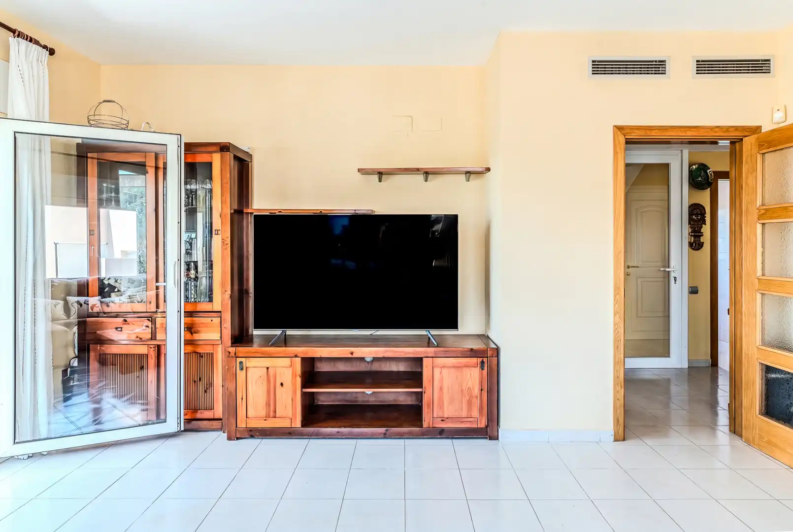 Sala d'estar de Casa o xalet en venda en L'Ampolla amb Aire condicionat, Calefacció i Jardí privat