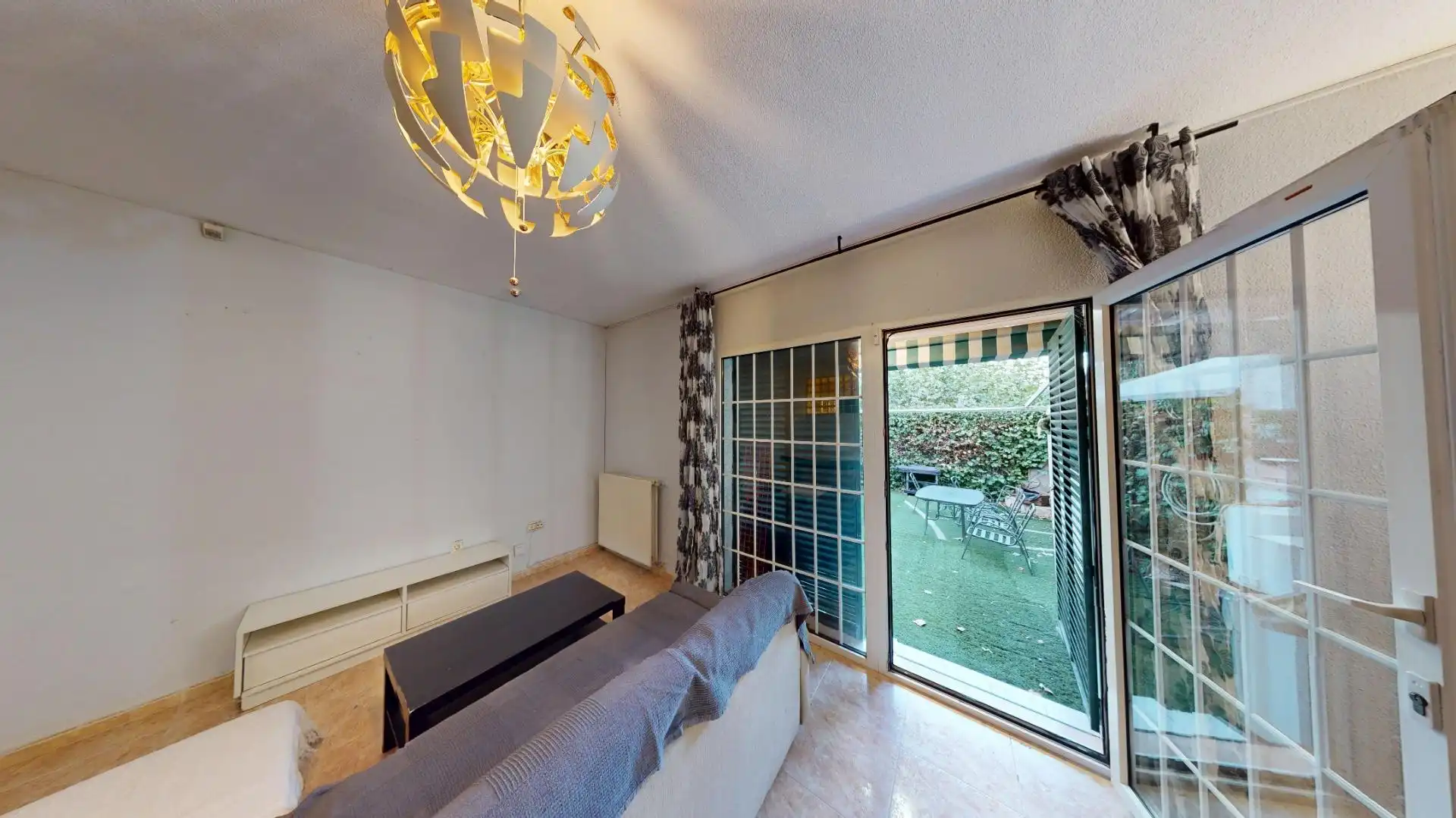 Sala de estar de Casa adosada en venta en El Molar (Madrid) con Calefacción, Jardín privado y Terraza