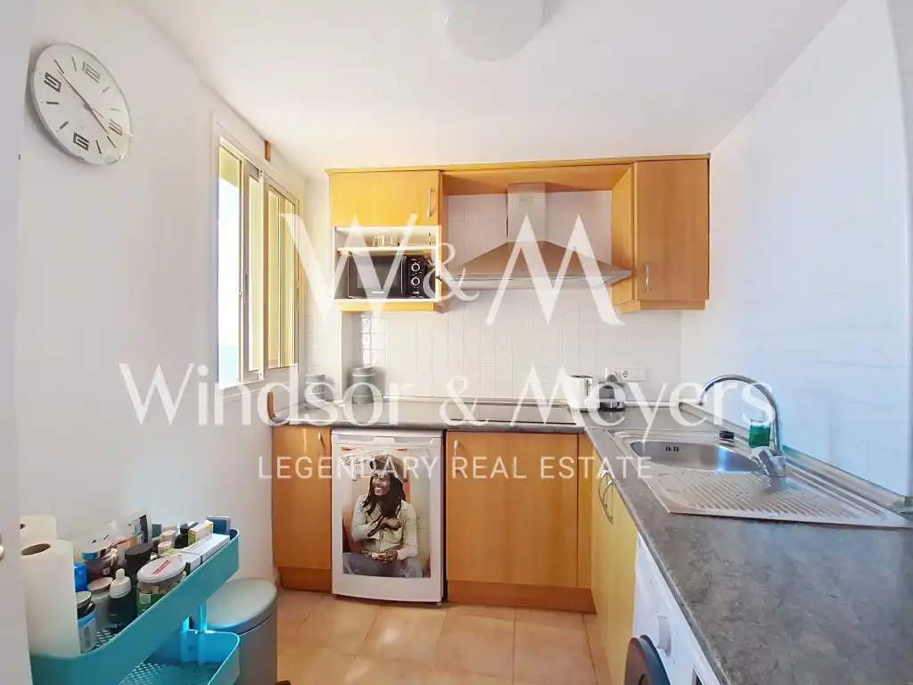 Cocina de Apartamento en venta en Santa Eulària des Riu con Aire acondicionado, Amueblado y Piscina comunitaria