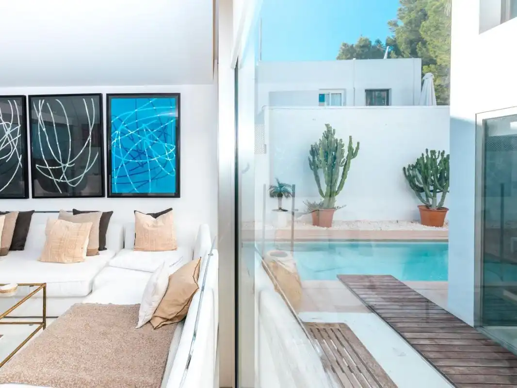 Sala de estar de Casa adosada en venta en Sant Josep de sa Talaia con Aire acondicionado, Calefacción y Piscina