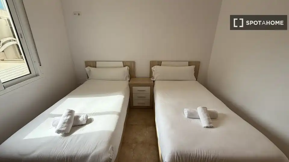 Dormitori de Apartament per a compartir en Málaga amb Aire condicionat, Terrassa i Moblat