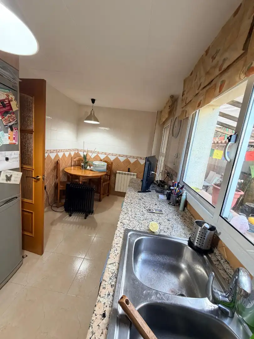 Cuina de Casa adosada en venda en Malgrat de Mar amb Aire condicionat, Calefacció i Jardí privat