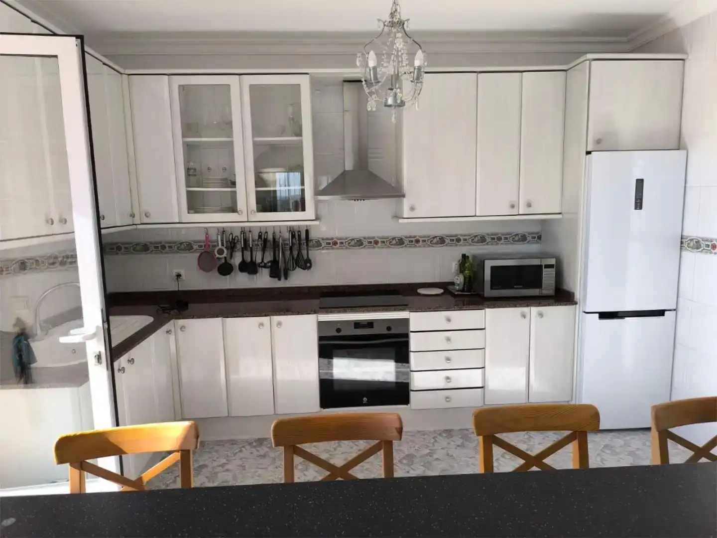 Kitchen of Flat for sale in Calpe / Calp  with Air Conditioner, Private garden and Swimming Pool