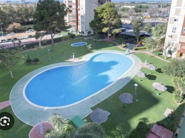 Appartement compact avec jardin à louer à Platja de la Pobla de Farnals