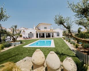 Vista exterior de Casa o xalet de lloguer en Casares amb Terrassa i Piscina