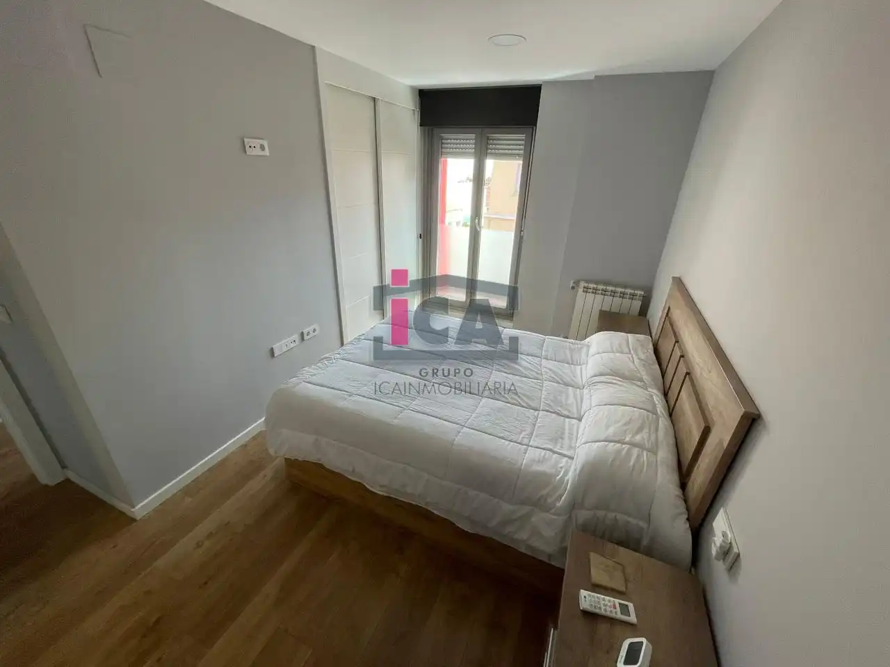 Dormitori de Apartament de lloguer en Cáceres amb Aire condicionat, Calefacció i Piscina
