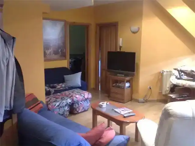 Sala de estar de Apartamento en venta en Riaño con Parquet, Amueblado y Horno