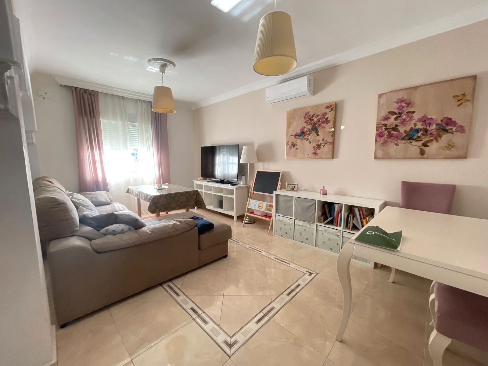 Living room of Single-family semi-detached for sale in Umbrete  with Air Conditioner, Terrace and Storage room