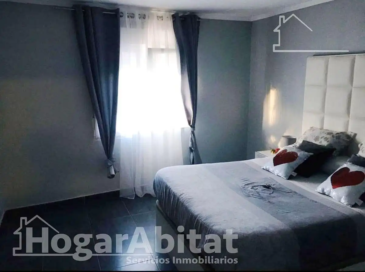 Dormitori de Casa adosada en venda en Sueca amb Moblat
