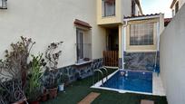 Swimming pool of Single-family semi-detached for sale in Alcalá del Río  with Air Conditioner, Heating and Private garden