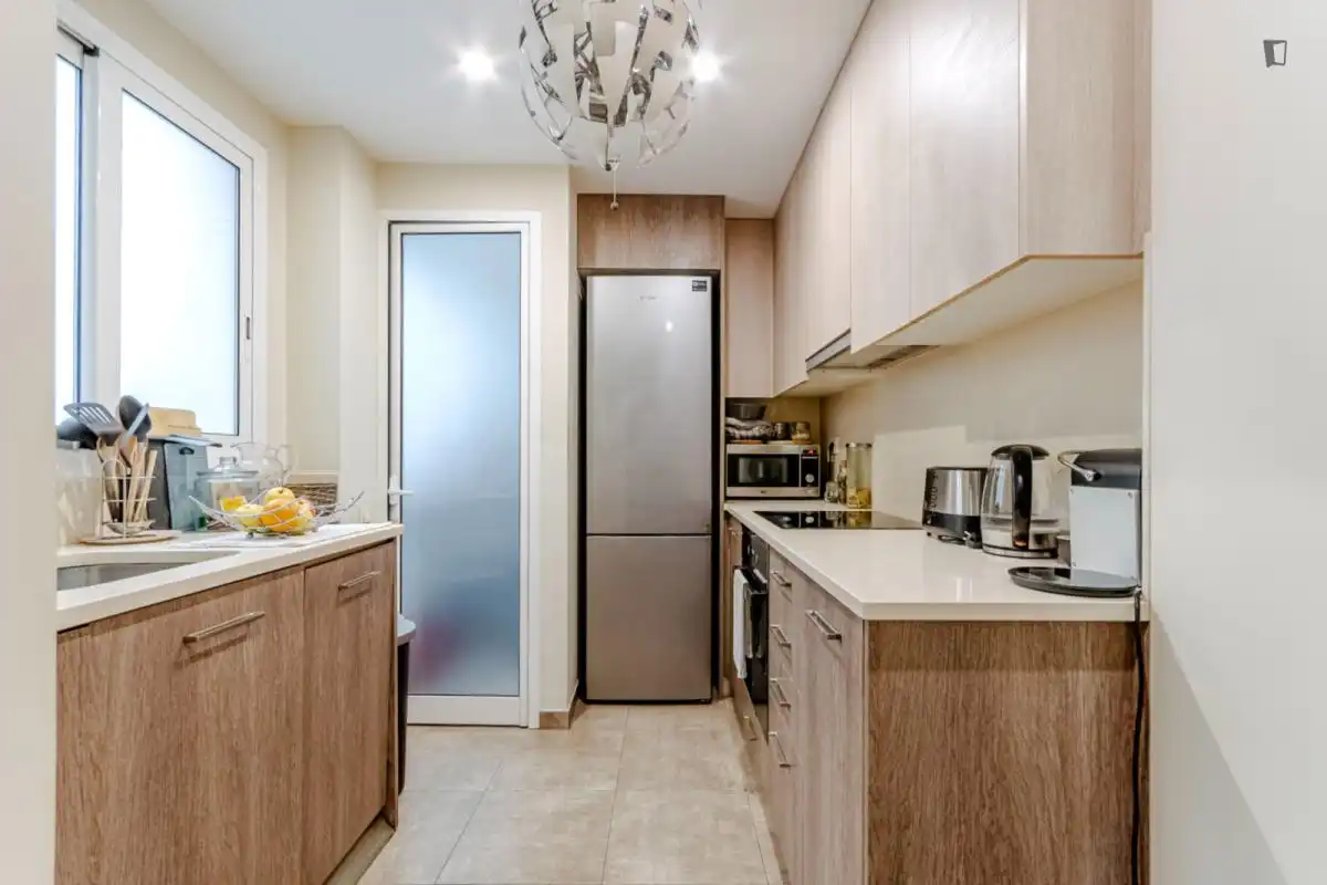 Cuina de Apartament per a compartir en Barcelona amb Aire condicionat, Calefacció i Moblat