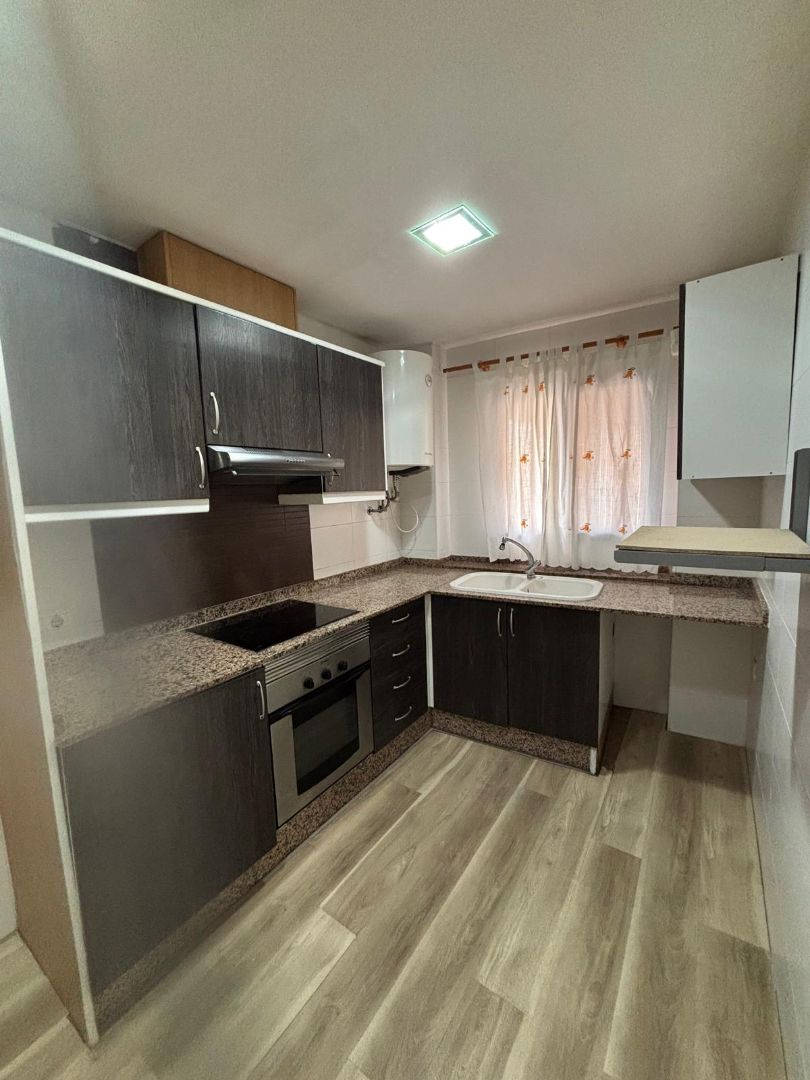 Kitchen of Flat for sale in Alginet  with Air Conditioner, Parquet flooring and Storage room