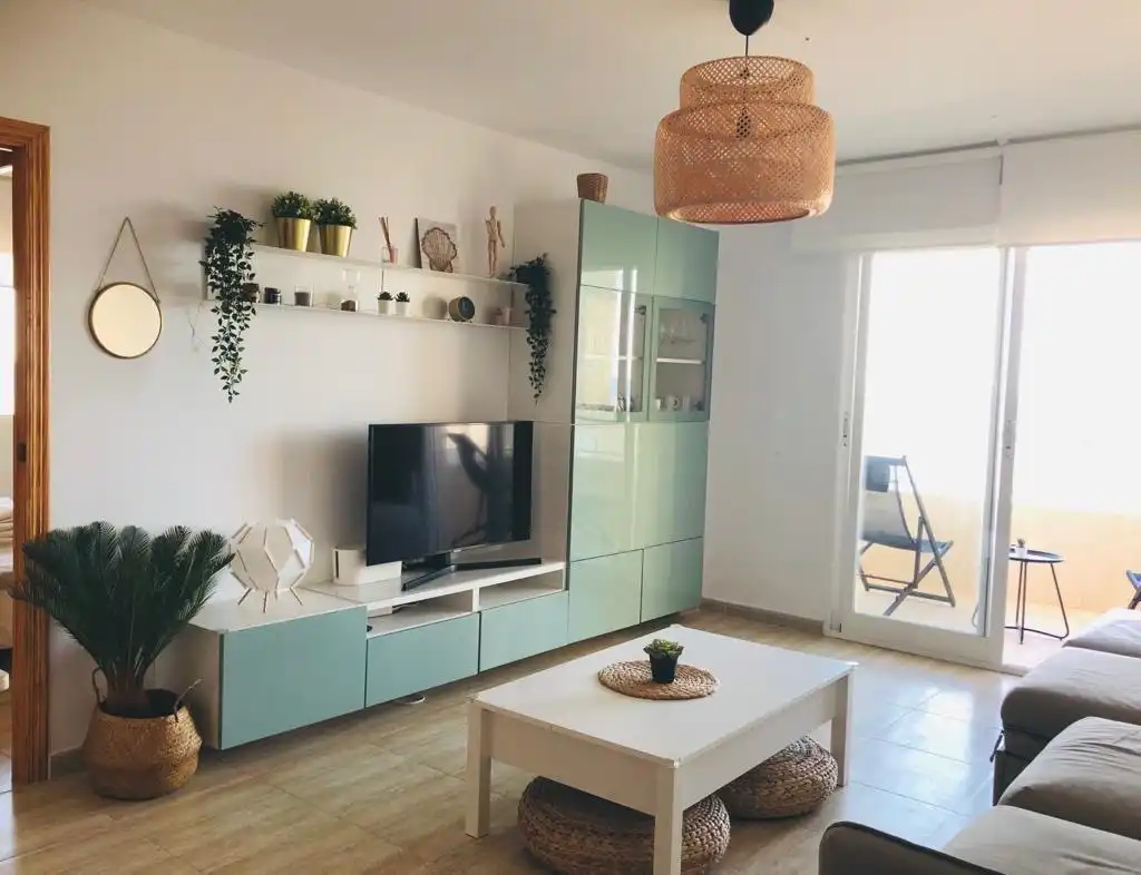 Sala d'estar de Apartament de lloguer en La Manga del Mar Menor amb Aire condicionat, Calefacció i Piscina