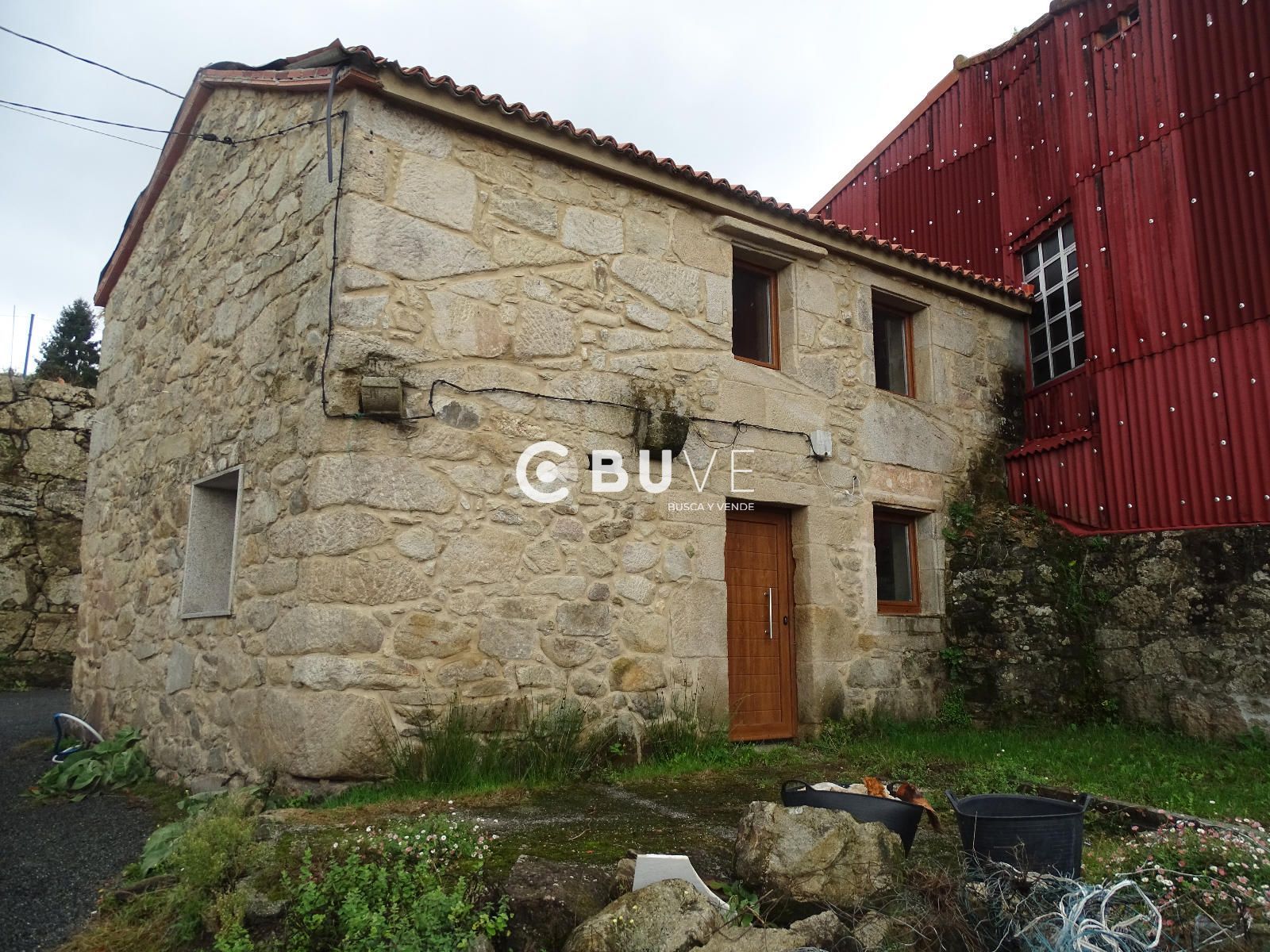 Vista exterior de Casa adosada en venda en Brión amb Jardí privat, Terrassa i Traster