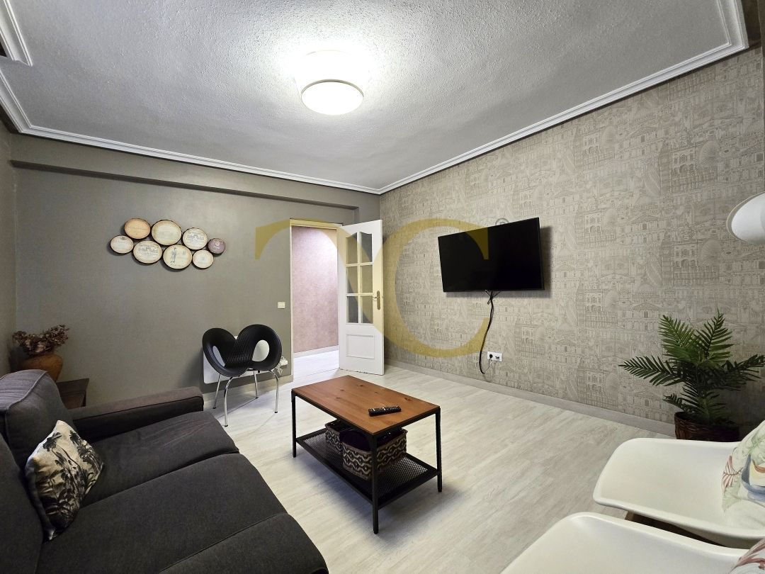 Living room of Flat for sale in Gijón   with Heating and Furnished