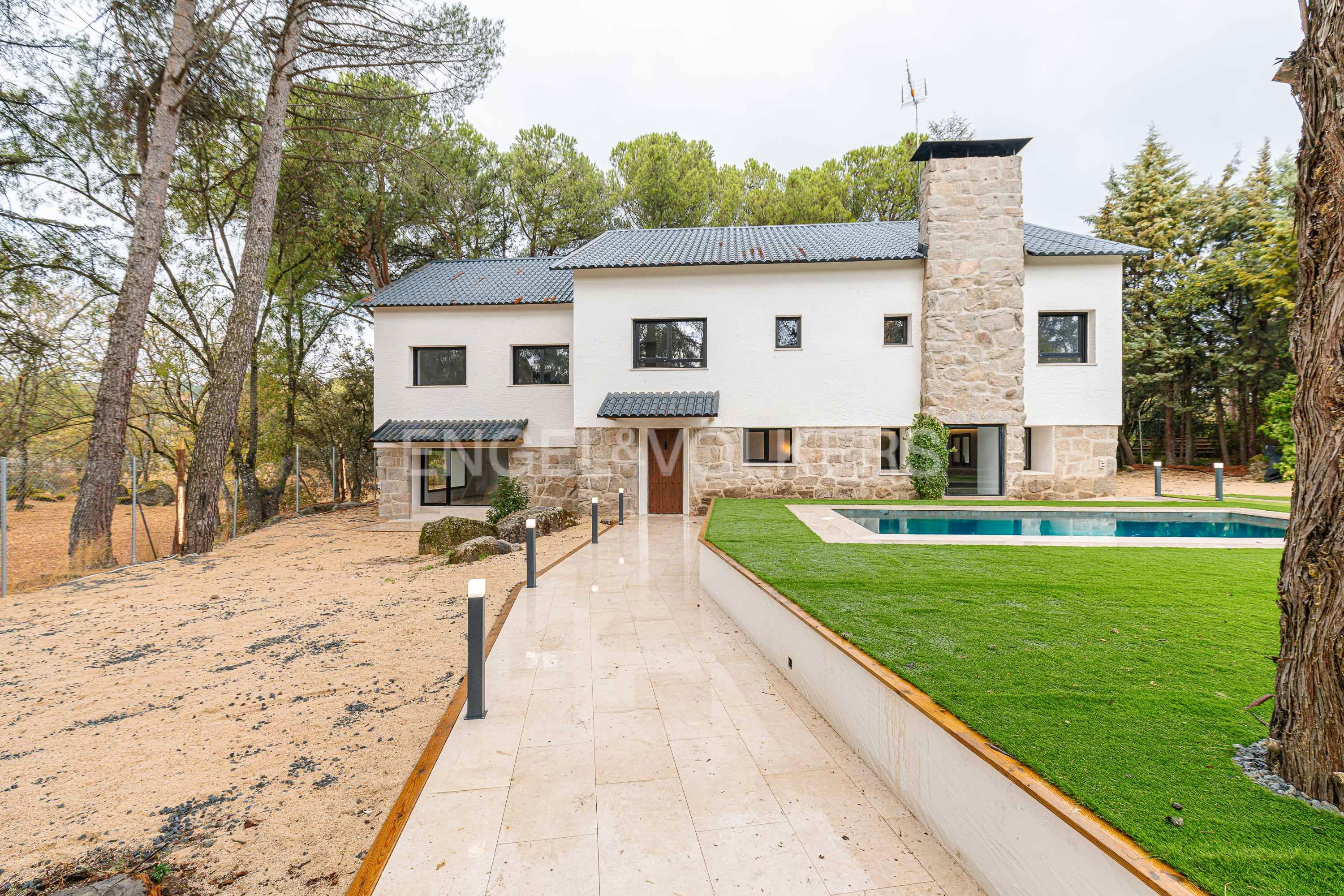 Vista exterior de Casa o xalet en venda en Alpedrete amb Calefacció, Jardí privat i Terrassa