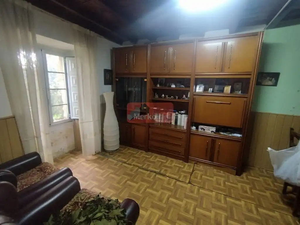 Sala de estar de Casa o chalet en venta en Sarria con Calefacción y Jardín privado