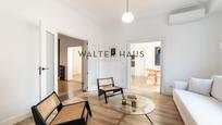 Living room of Flat for sale in  Madrid Capital  with Terrace, Storage room and Furnished