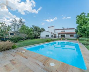 Swimming pool of House or chalet for sale in Tres Cantos  with Air Conditioner, Terrace and Swimming Pool