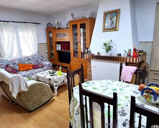 Sala d'estar de Casa adosada en venda en Villena amb Terrassa i Piscina comunitària