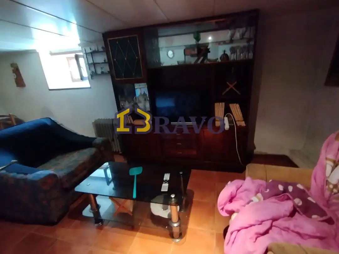 Sala de estar de Casa adosada en venta en Junta de Traslaloma con Calefacción, Jardín privado y Amueblado