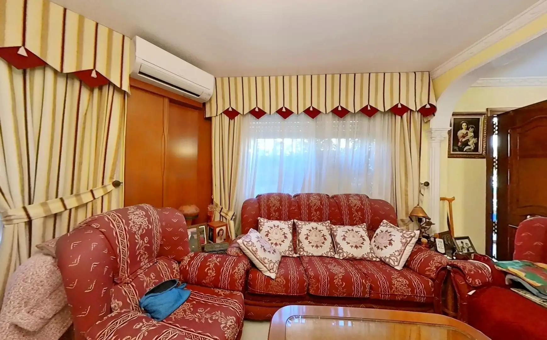 Sala d'estar de Casa adosada en venda en Málaga amb Aire condicionat, Terrassa i Piscina comunitària