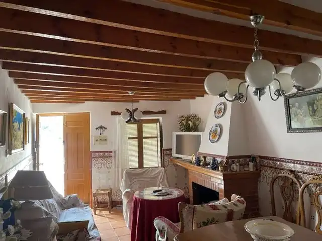 Sala d'estar de Casa o xalet en venda en Nacimiento amb Traster i Moblat