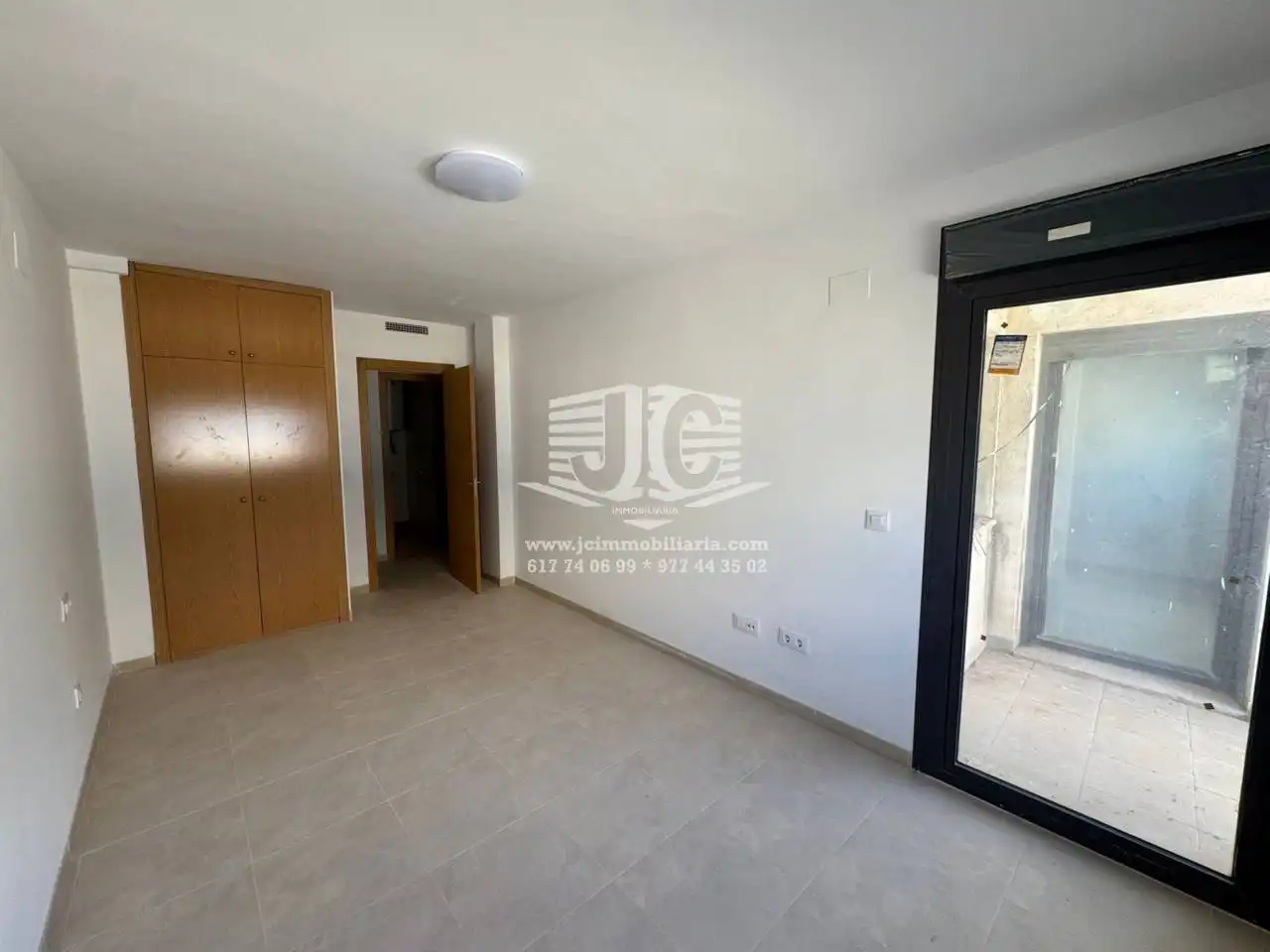Bedroom of Flat for rent in L'Aldea  with Air Conditioner, Terrace and Storage room