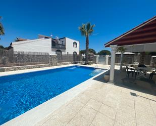 Swimming pool of House or chalet for sale in  Huelva Capital  with Air Conditioner, Private garden and Terrace