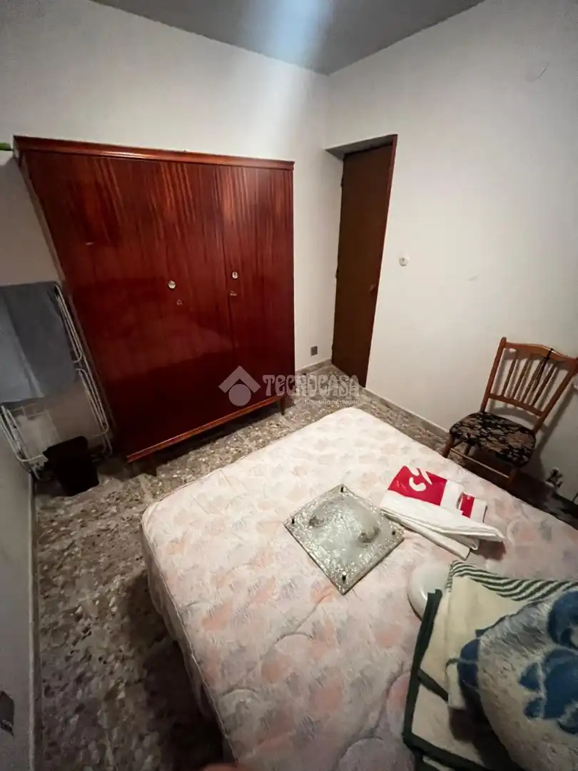 Habitación de Casa adosada en venta en Puertollano con Calefacción