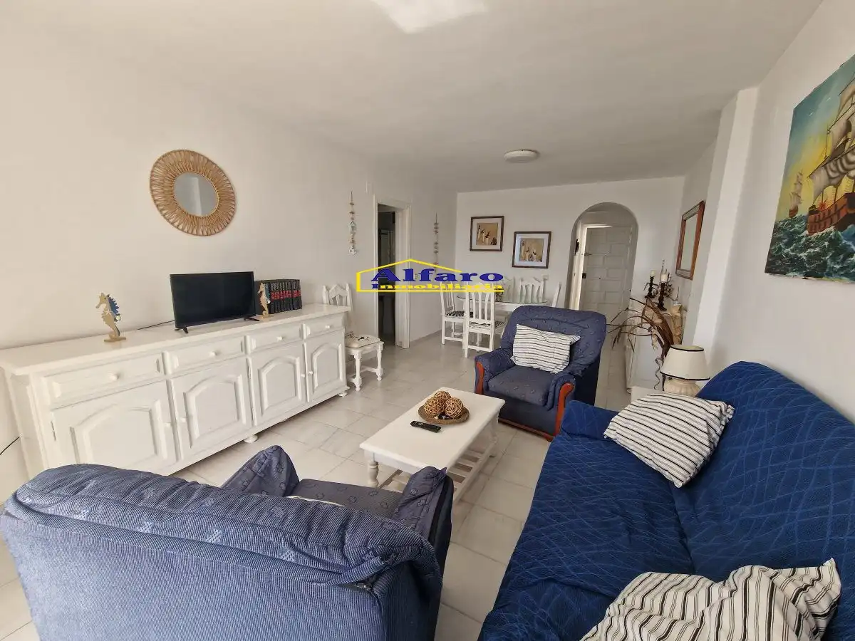 Sala de estar de Piso en venta en Almonte con Terraza, Balcón y Piscina comunitaria