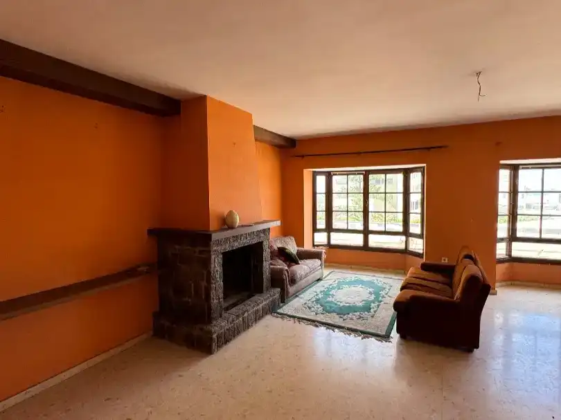 Sala d'estar de Casa o xalet en venda en Fuengirola amb Aire condicionat i Balcó