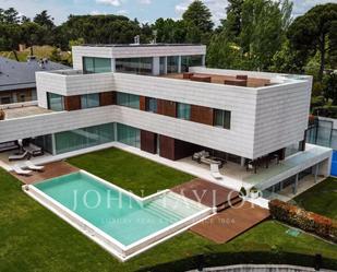 Exterior view of House or chalet for sale in  Madrid Capital  with Air Conditioner, Swimming Pool and Jacuzzi