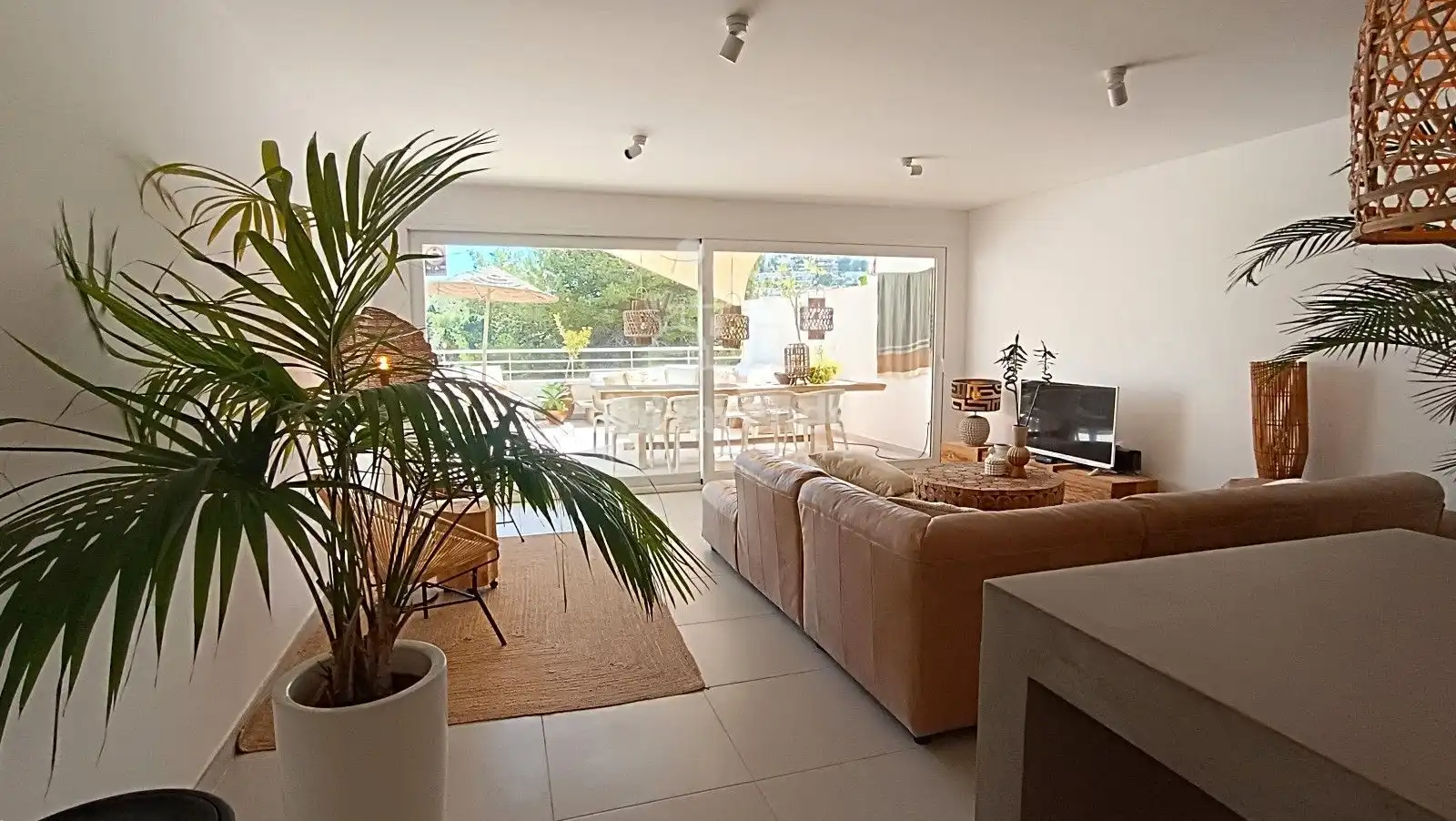 Sala d'estar de Casa adosada en venda en Santa Eulària des Riu amb Aire condicionat, Terrassa i Moblat