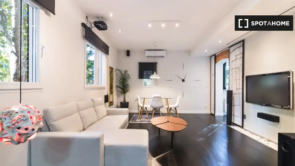 Sala de estar de Estudio para compartir en Madrid con Aire acondicionado, Terraza y Amueblado