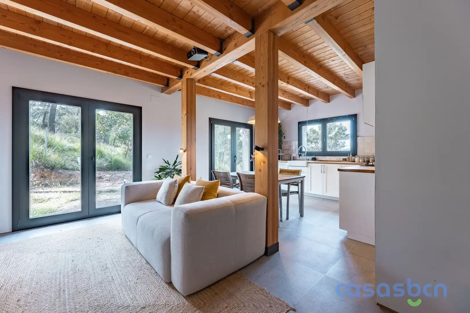 Sala d'estar de Casa o xalet en venda en Begues amb Jardí privat