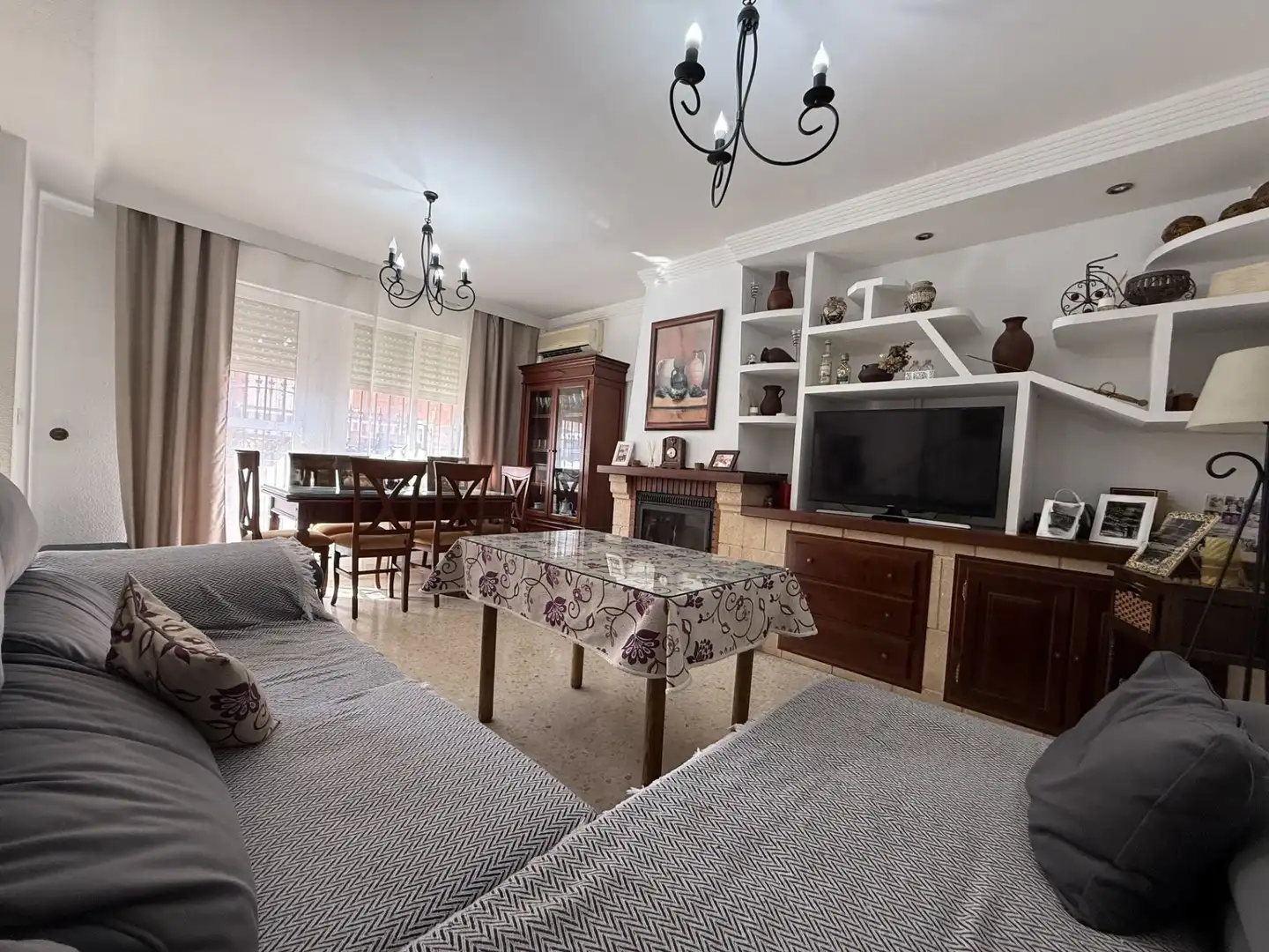 Sala de estar de Casa adosada en venta en Aljaraque con Aire acondicionado