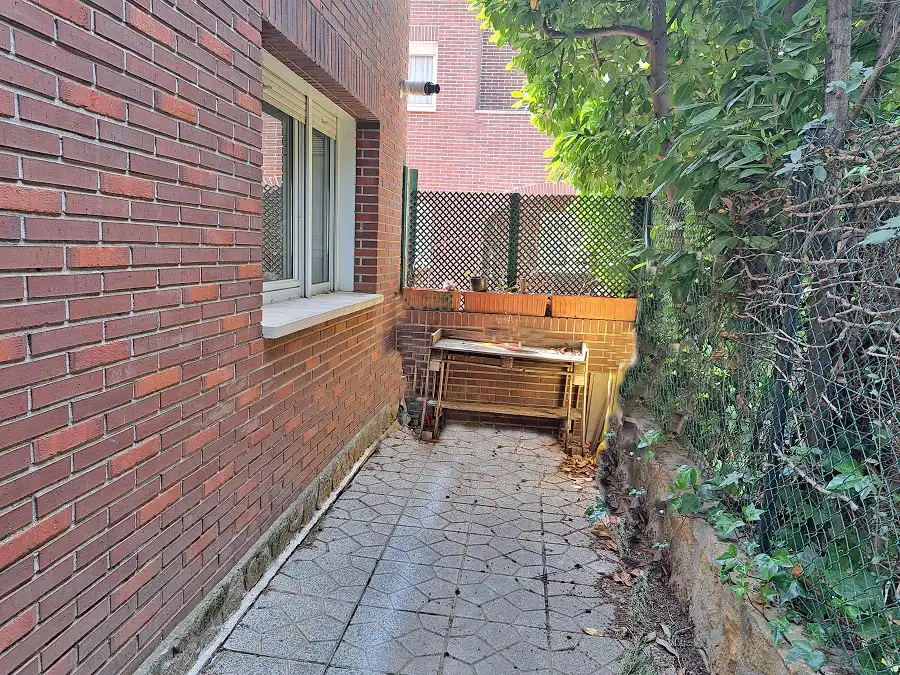 Vista exterior de Casa adosada en venda en Torrelodones amb Calefacció, Jardí privat i Parquet