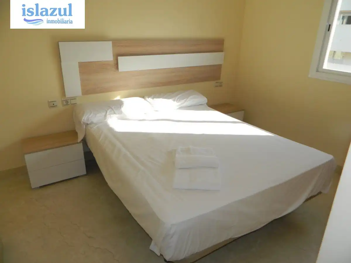 Habitación de Apartamento de alquiler en Isla Cristina con Aire acondicionado, Jardín privado y Terraza