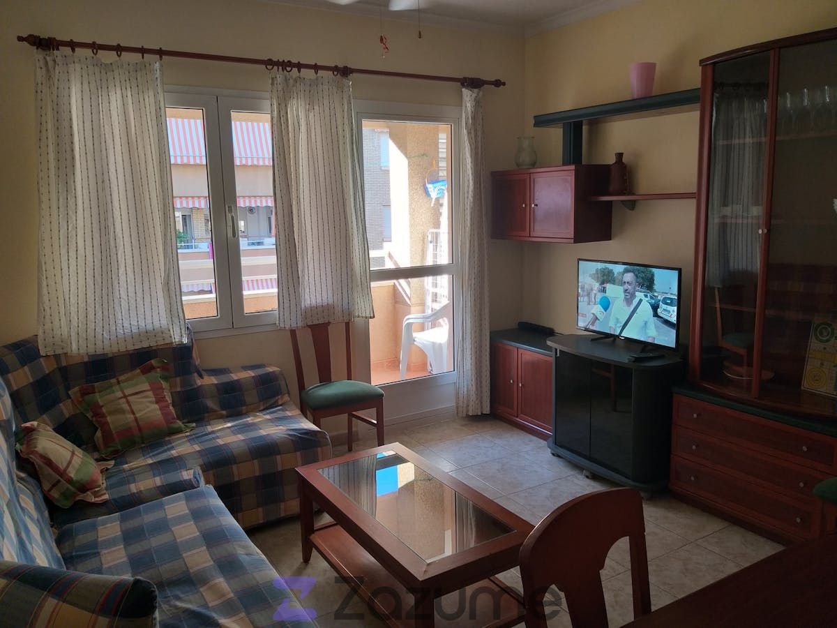 Sala d'estar de Pis de lloguer en Águilas amb Aire condicionat, Terrassa i Piscina