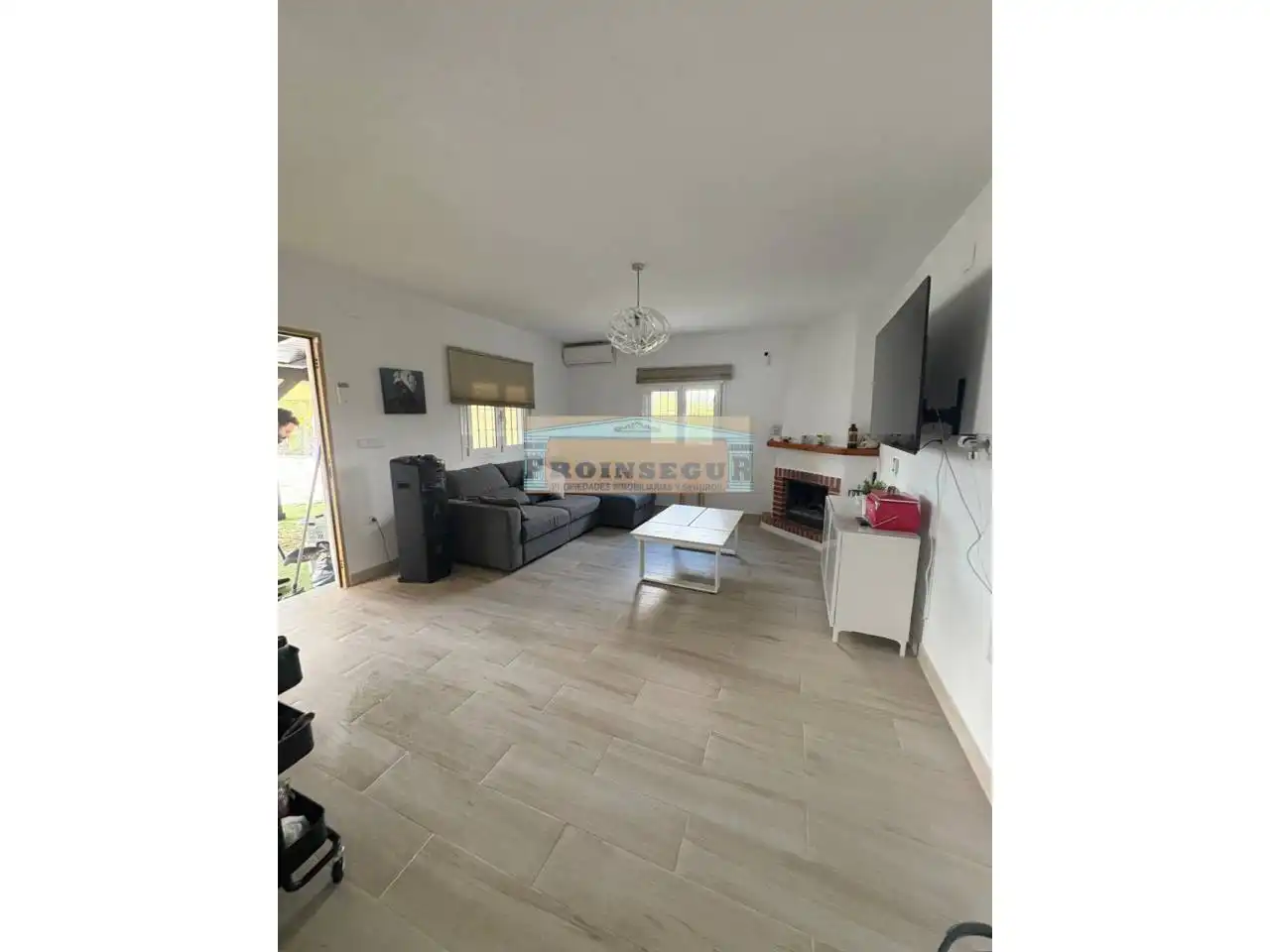 Sala d'estar de Casa o xalet en venda en Cártama amb Piscina
