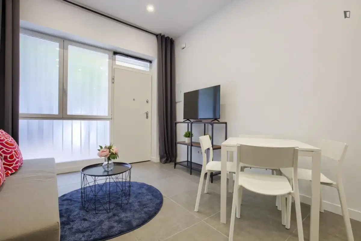 Sala d'estar de Apartament de lloguer en  Madrid Capital amb Aire condicionat, Moblat i Forn